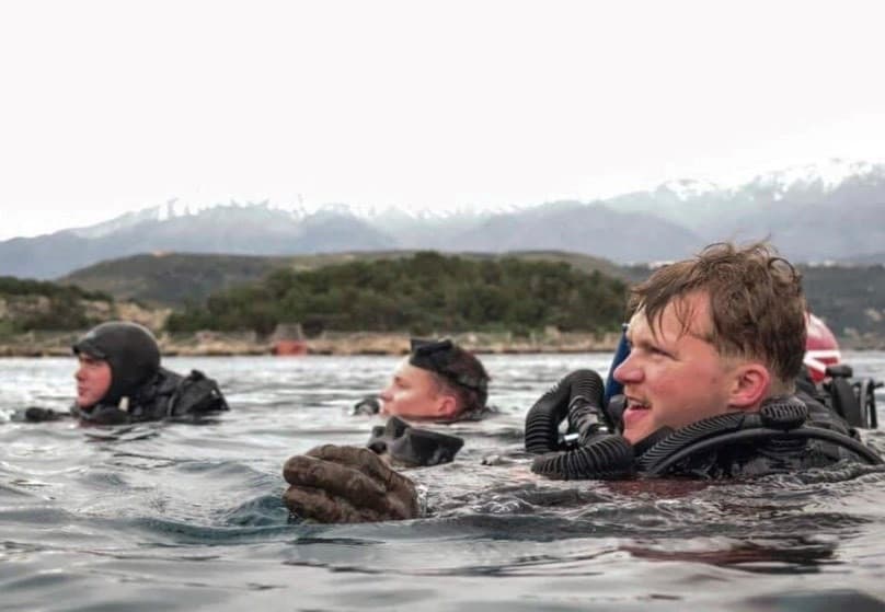 Maritime Raid Force Marines assigned to the 26th Marine Expeditionary Unit (26th MEU), including Austin Gibson (at right), take part in dive training in Crete, Greece.