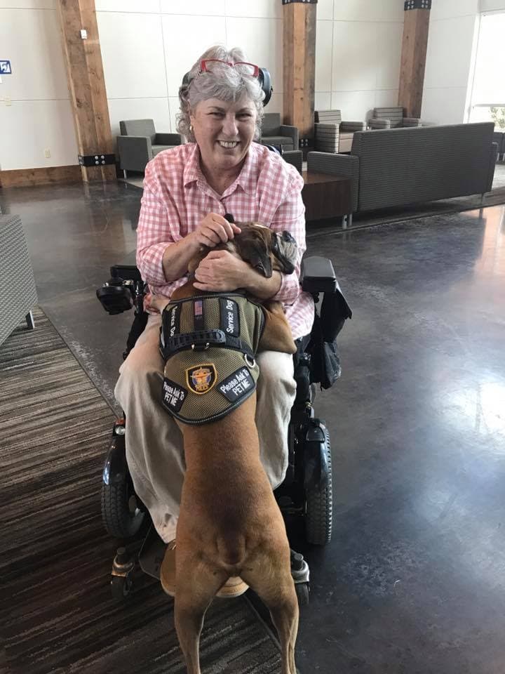 Officer Lisa Ramsey sits in her ALLY chair, which has given her greater freedom of movement and mobility than would a traditional wheelchair.