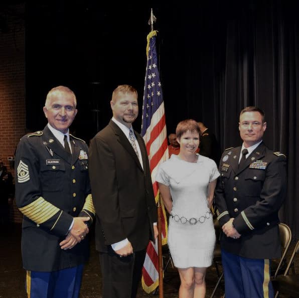 Ashley Goepfert poses with Grand Canyon University Army ROTC cadre during a graduation ceremony in 2013.