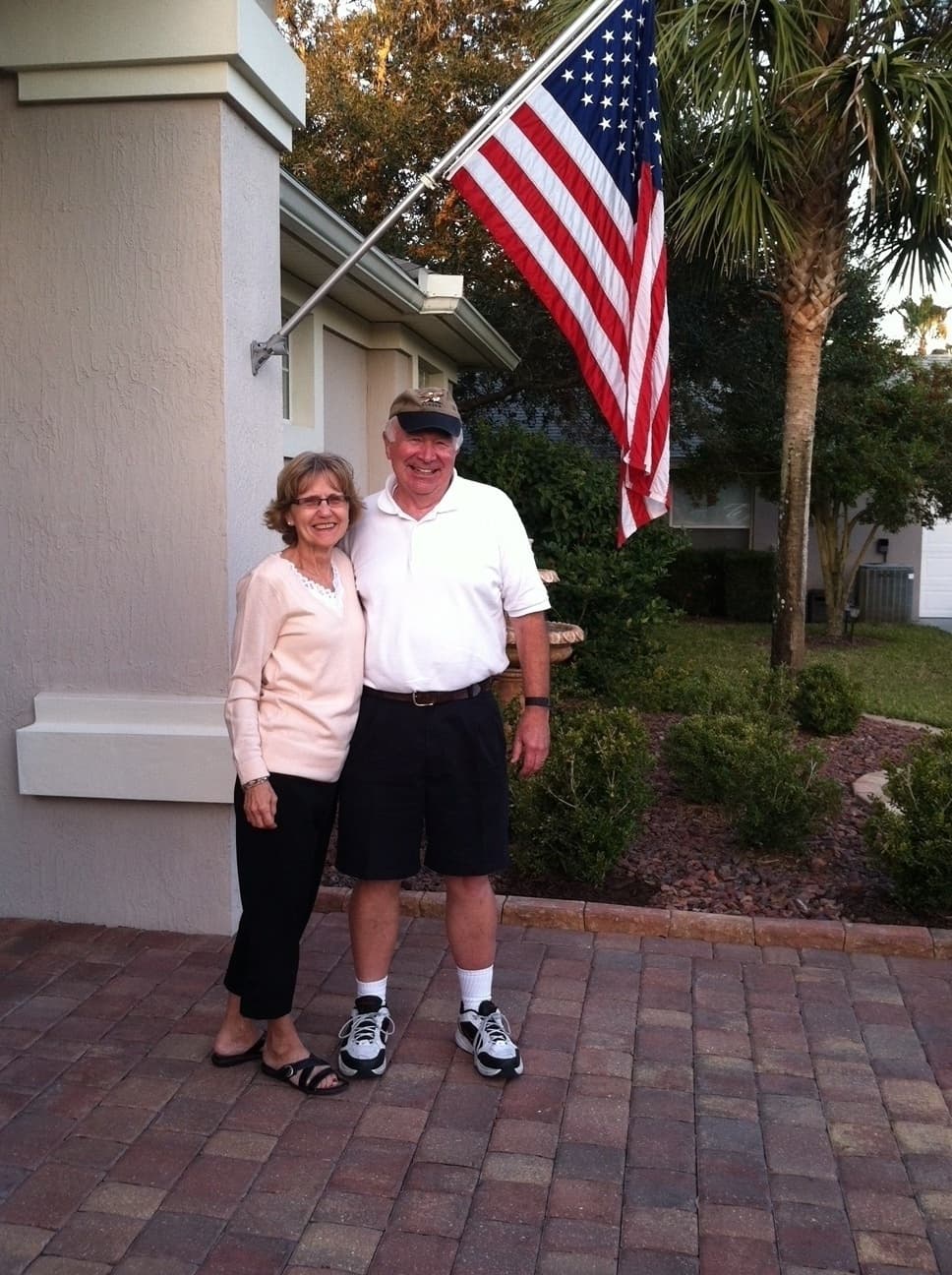 Longtime friends Junell Lofthus and Richard Kuhlman stand outside Junell's home in St. Augustine, Florida.