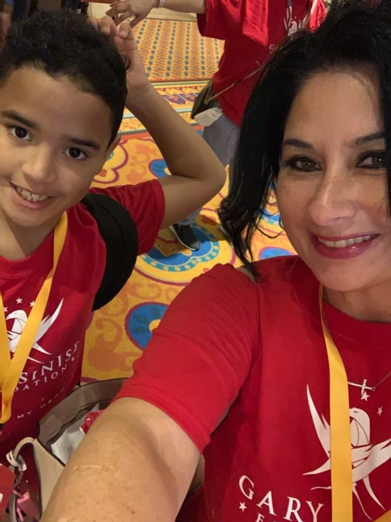 Kayce Lee and her son, Dennis, at Snowball Express in 2019 at Walt Disney World in Orlando, Fla.